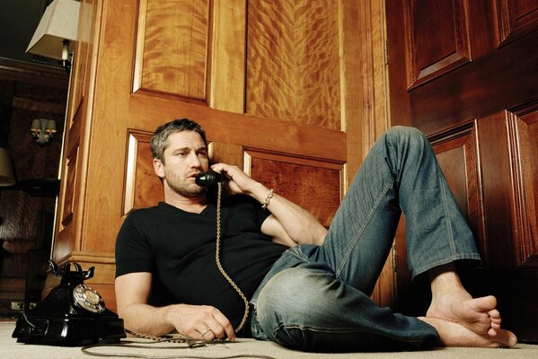 Gerard butler photo with retro phone