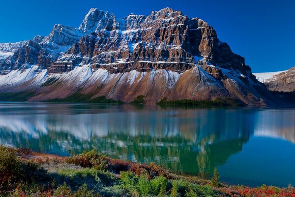 Snow-capped mountains and a lake. Nature