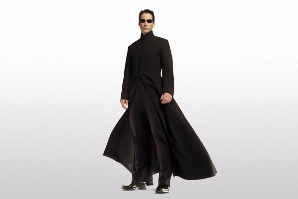 A man and a matrix movie in a beautiful black raincoat