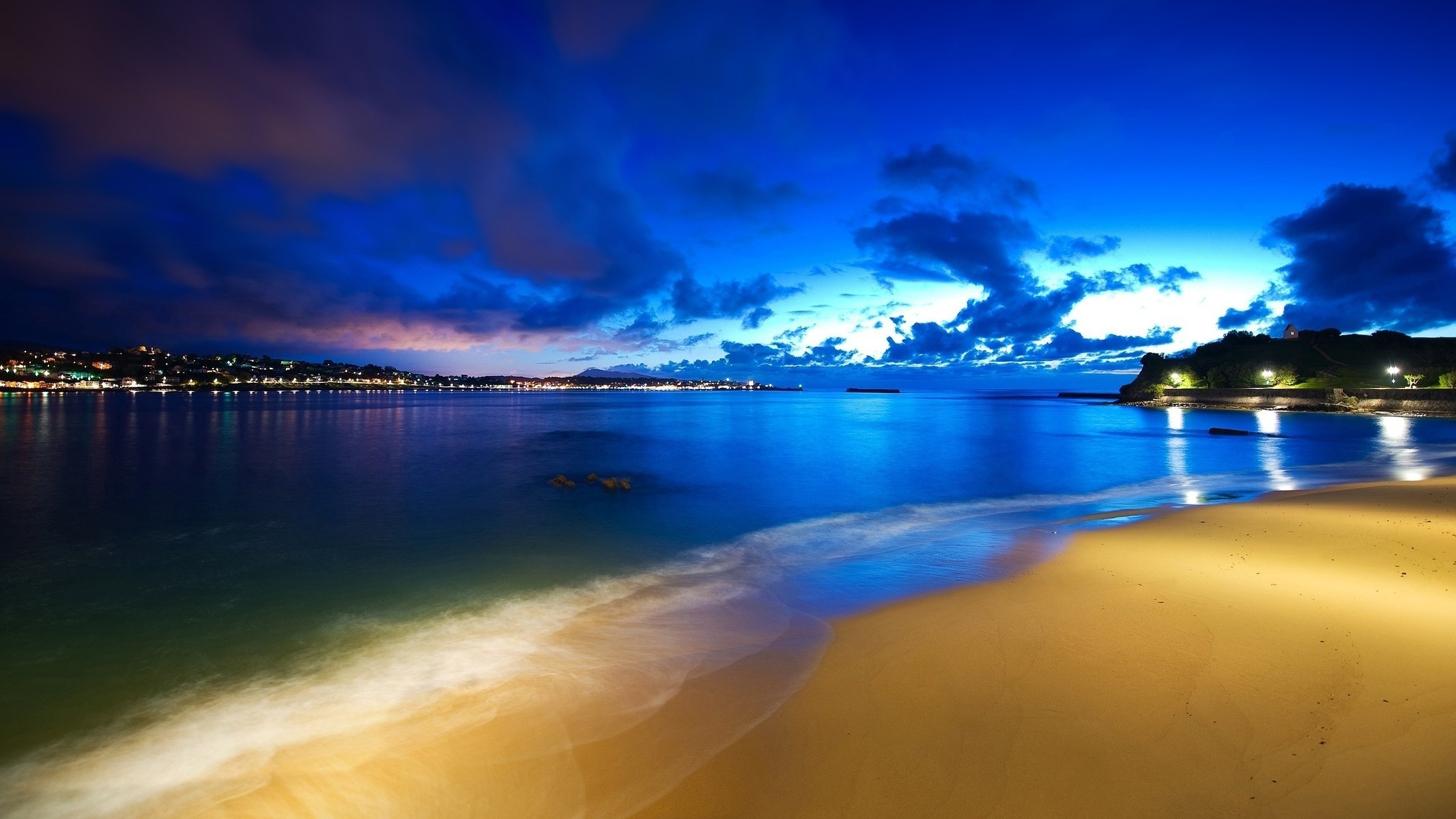 océano nubes cielo luces noche playa