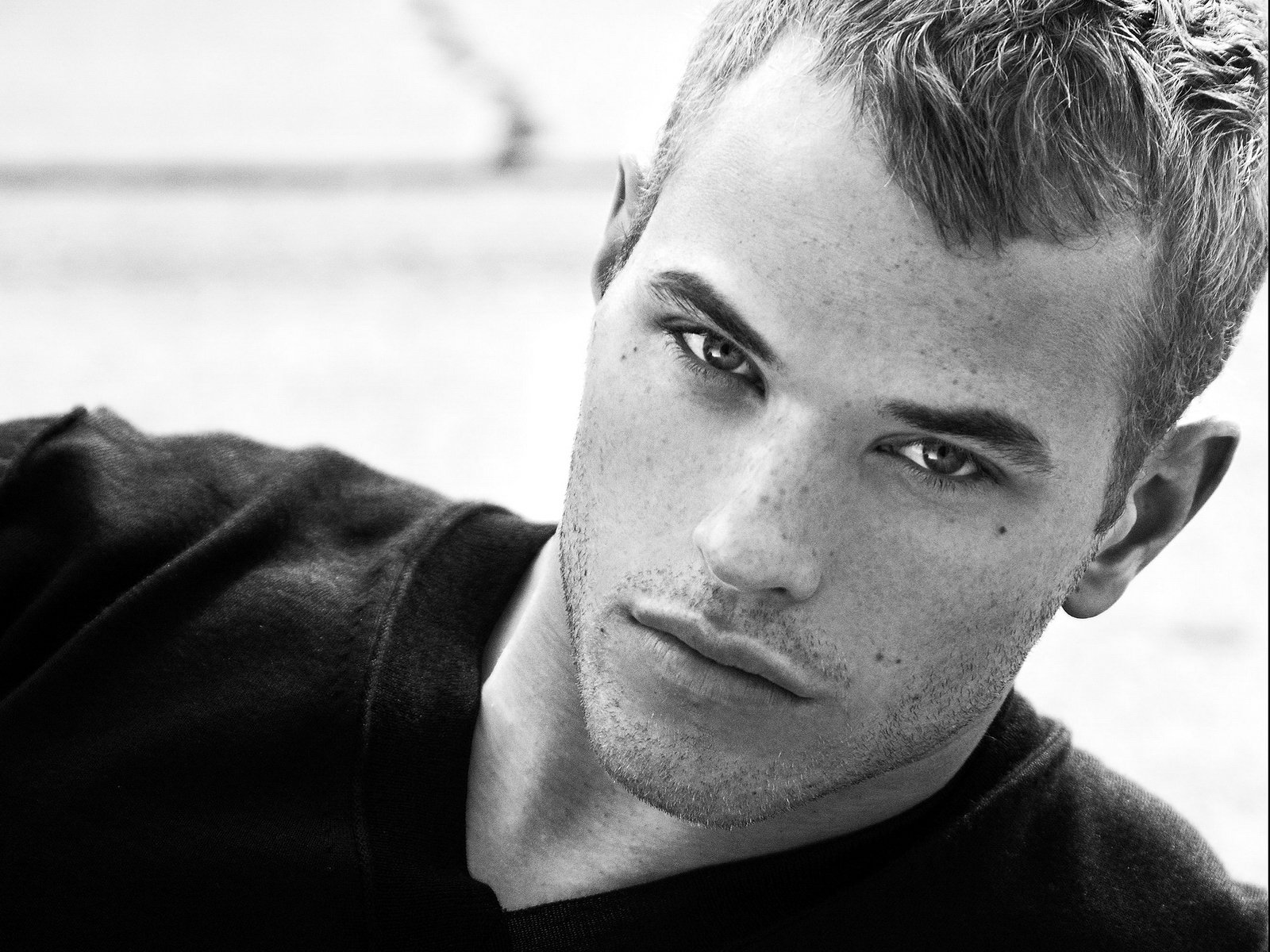 blonde handsome guy kellan black-and-white photo