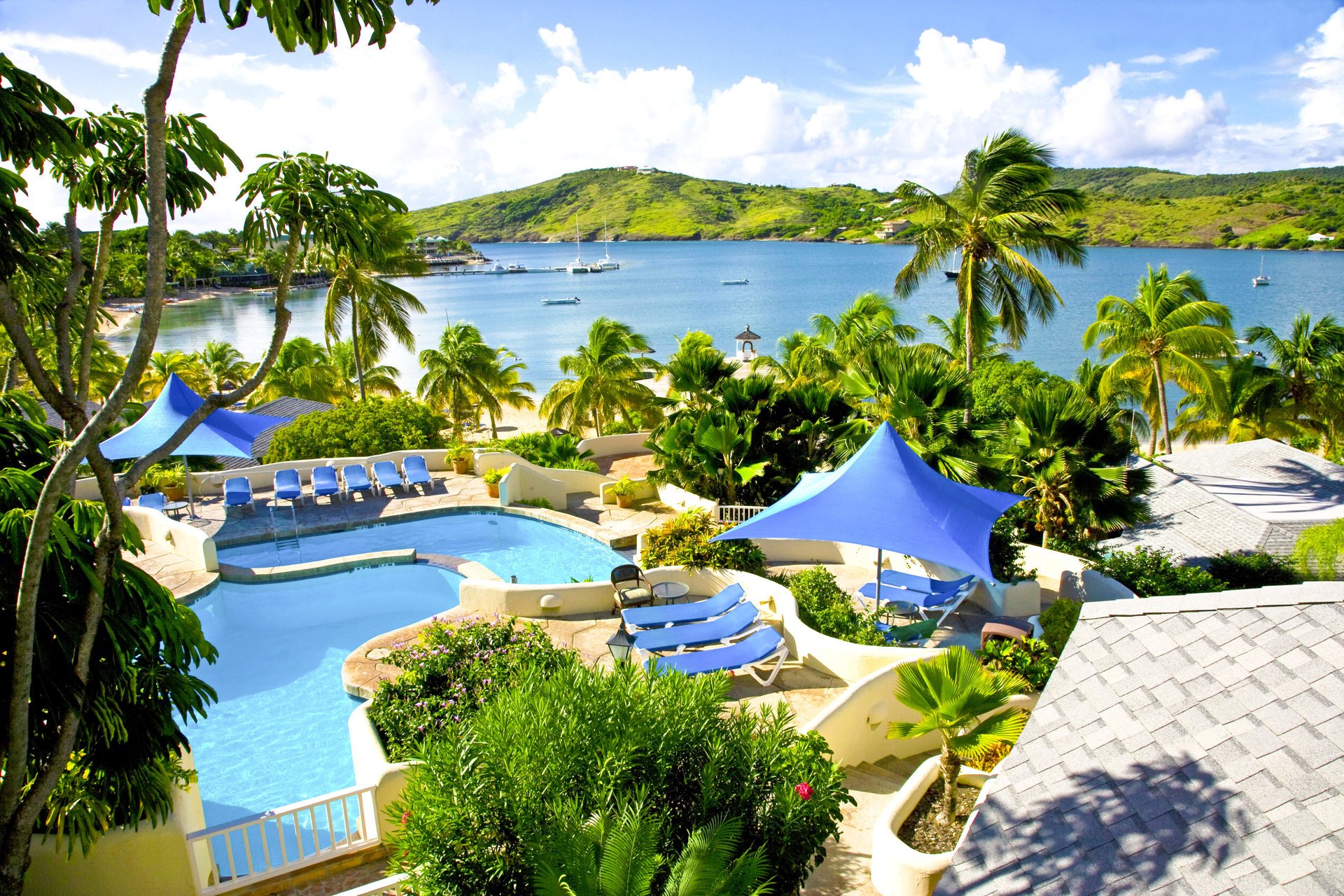 foto tropici spiaggia resort hotel piscina palme