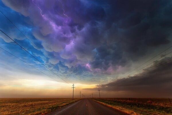 Road and clouds with lightning