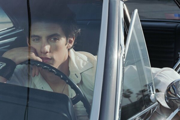 Milo Ventimiglia driving a car