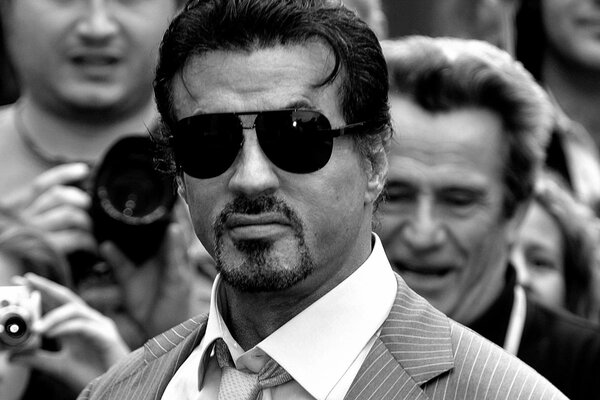 Sylvester Stallone in dark glasses