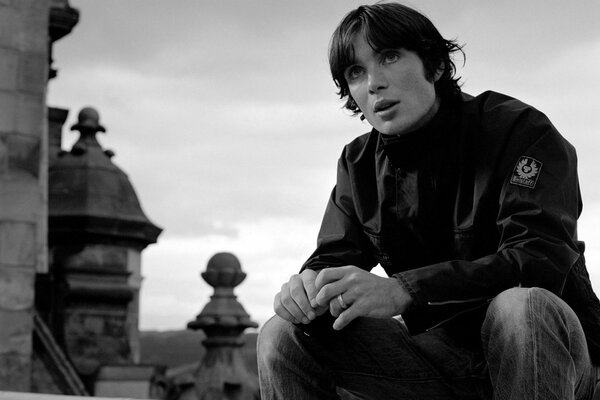 Black and white photo of a thoughtful guy