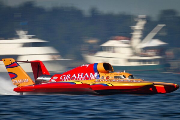 A sports boat develops great speed