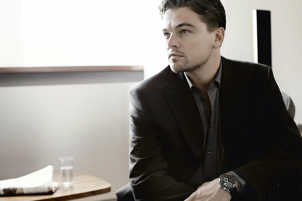 Leonardo DiCaprio in a suit with a watch