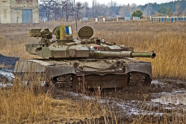 Armored military tank at the training ground