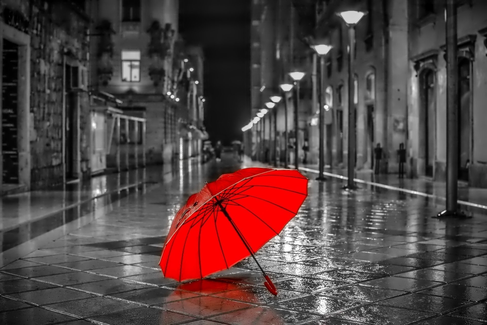 calle lluvia paraguas rojo