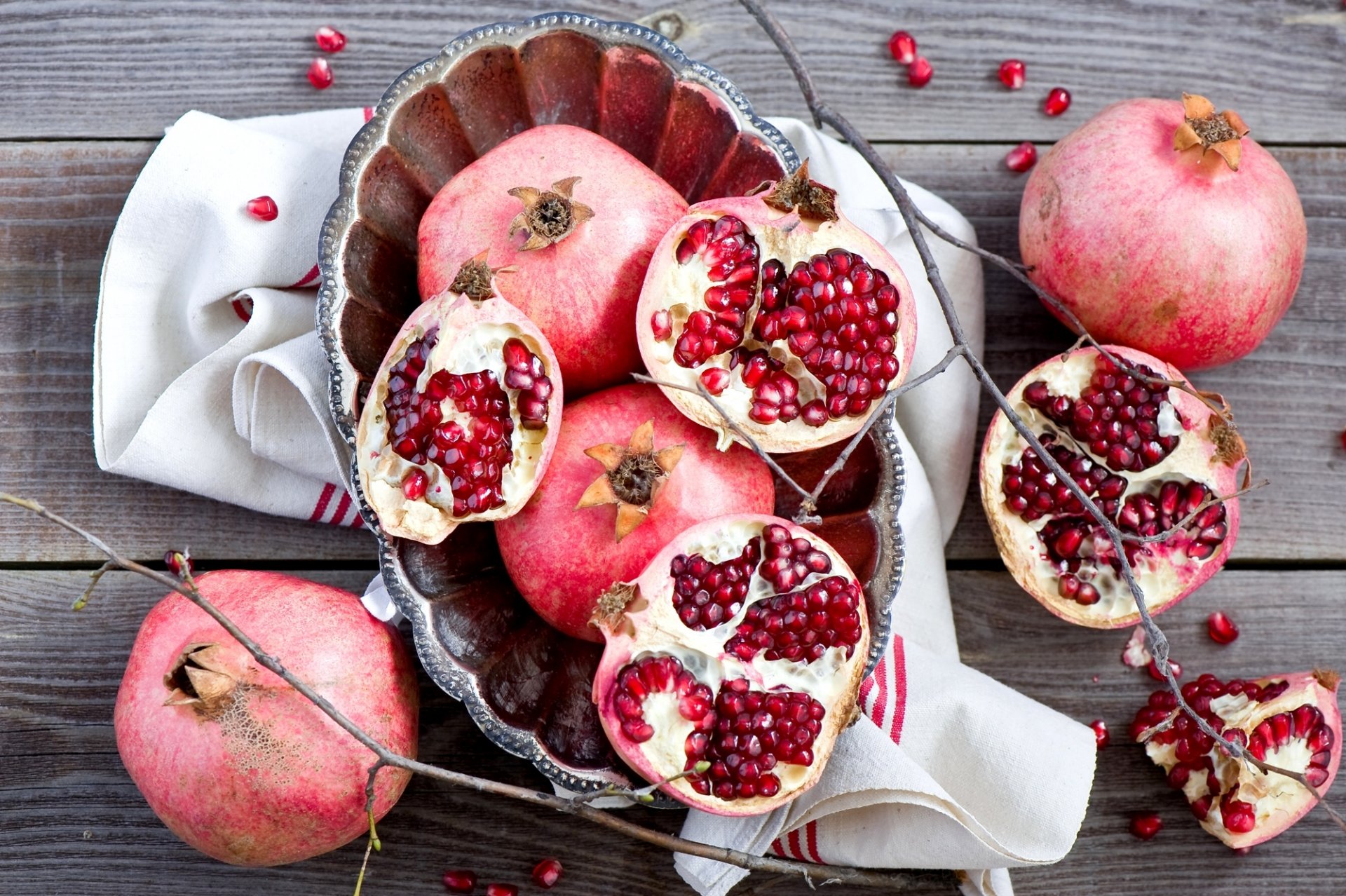 pomegranates fruits grains red plate branches twigs winter still life anna verdina