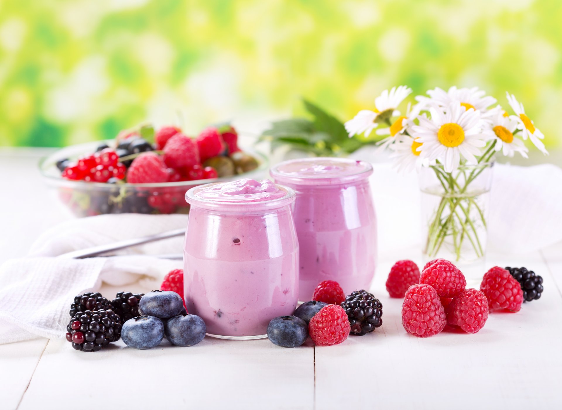 yogurt jars blueberries blackberry raspberry berries chamomile flower dessert