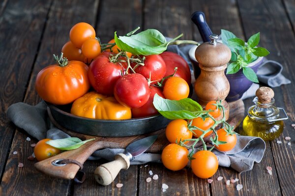 Still life of yellow and red tomatoes