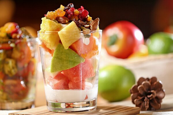 Dessert of fruits and berries in a glass