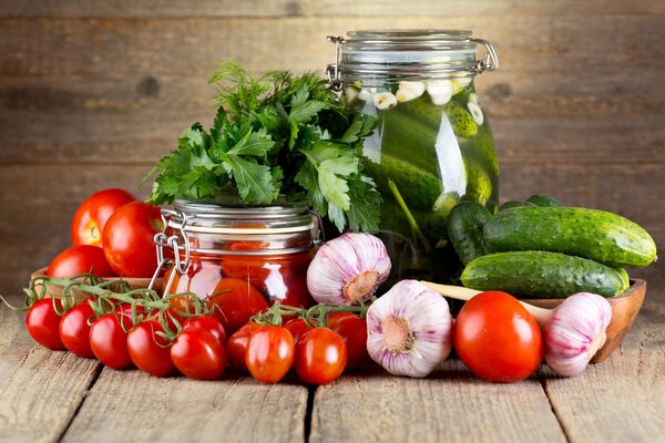 Still life with cherry tomatoes garlic and cucumbers