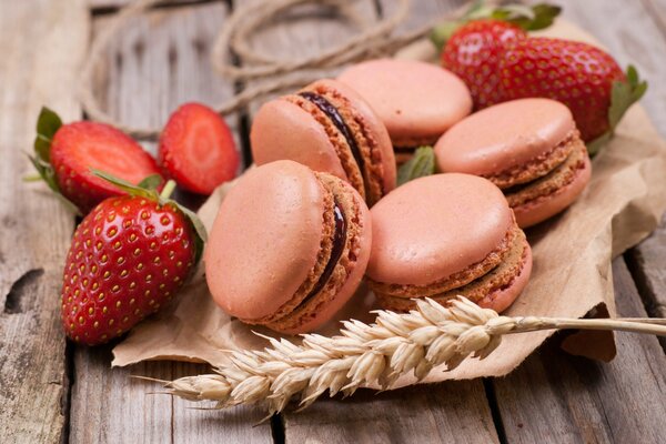 Nature morte avec des macarons et des fruits