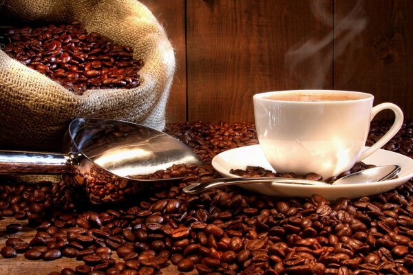 Large-grain coffee in a bag and a cup with a ready-made drink