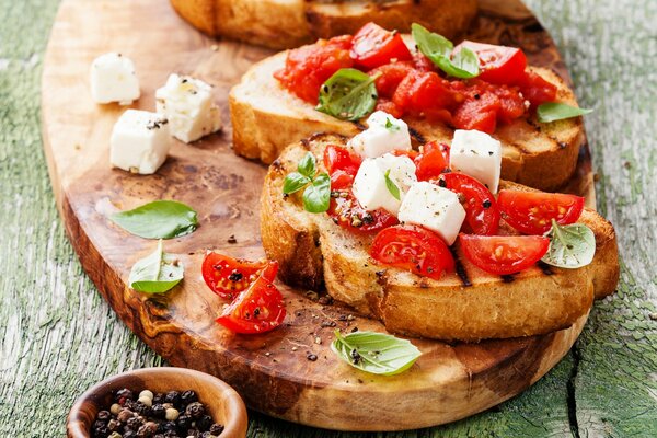 Photo d un sandwich à la tomate et au fromage