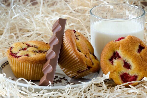 Cupcakes and chocolate with milk