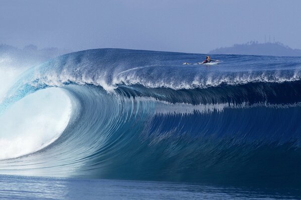 Surfing on a huge wave