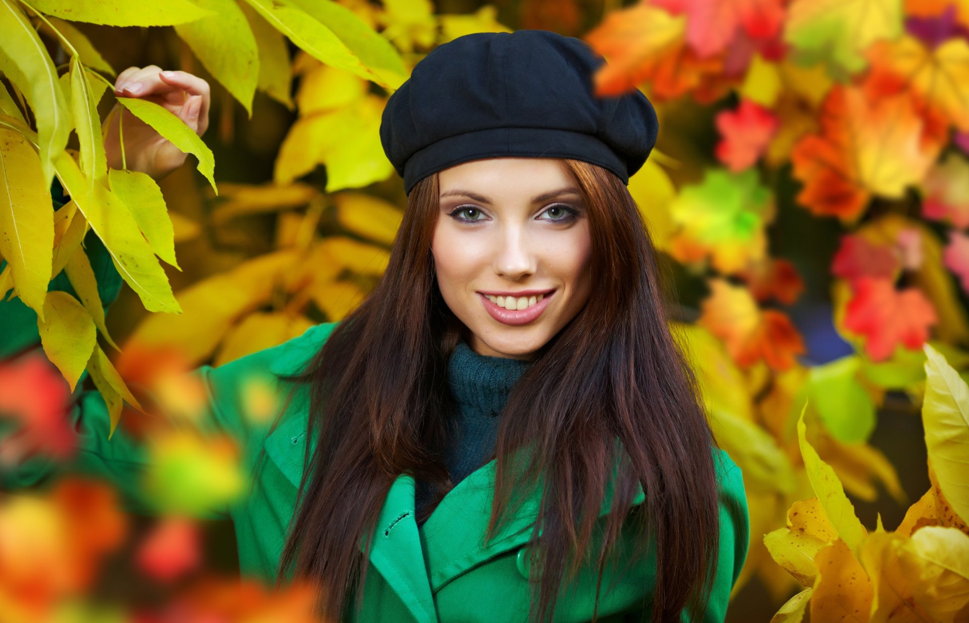 girl autumn brown hair takes coat nature leaves yellow foliage happiness smile