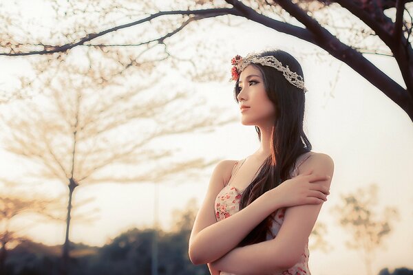 Oriental girl posing in nature