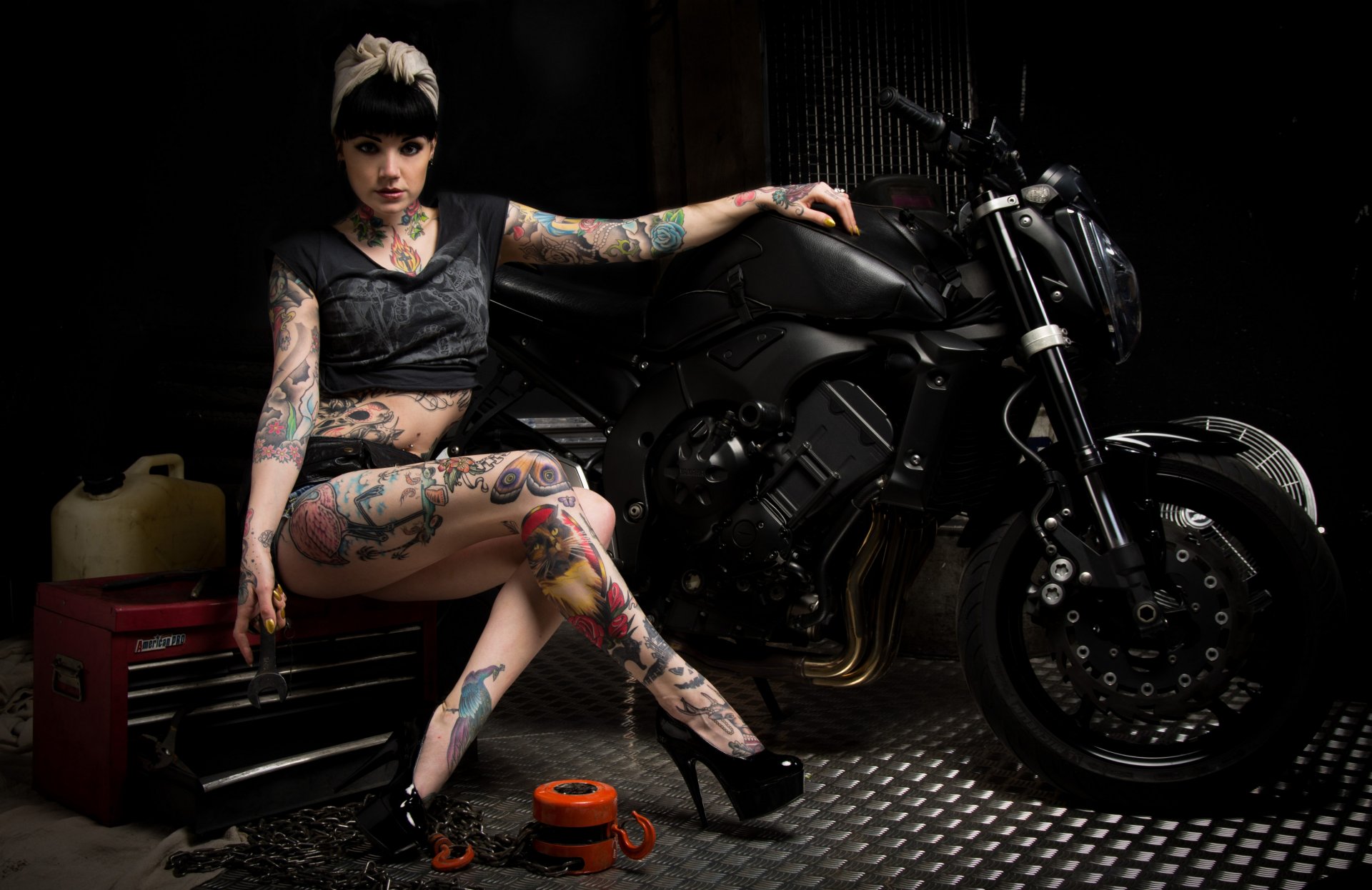 tattoos woman motorcycle tool