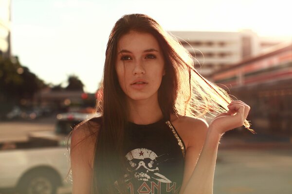 Brown-eyed girl in a T-shirt with long hair