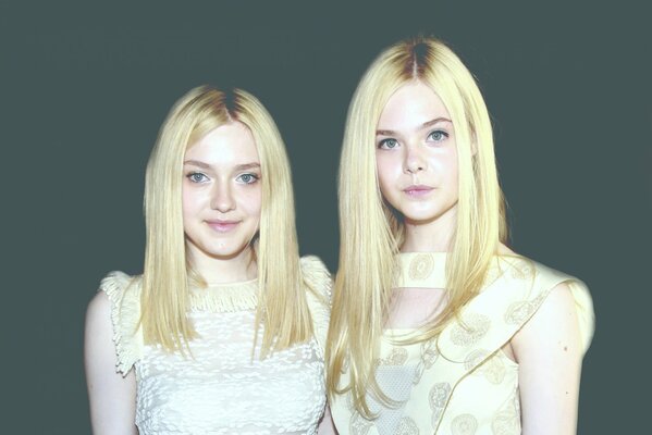Two sisters in white outfits