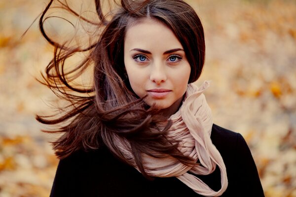 Girl in a scarf autumn photo