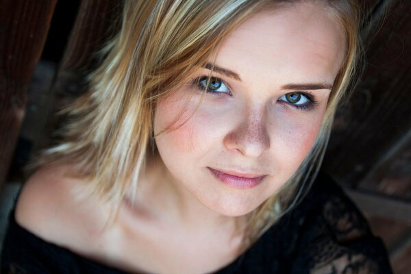 Beautiful look of a girl with freckles