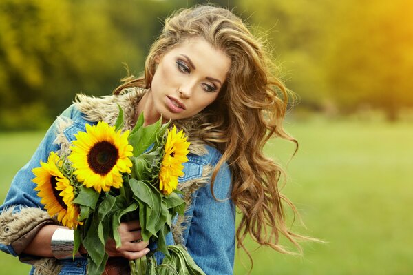 Girl with sunflowers photo portrait autumn