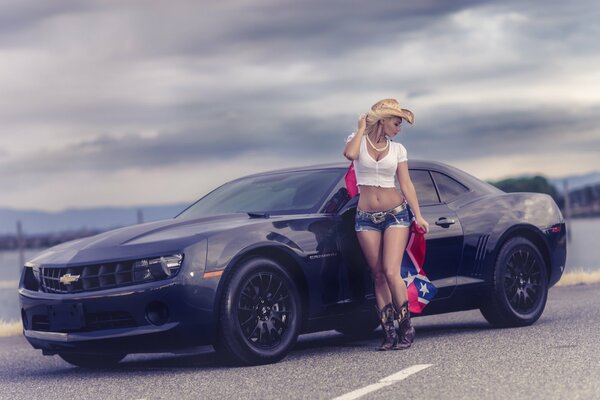 Chevrolet camaro. Girl in shorts
