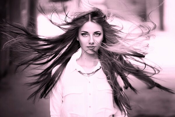 The wind develops Nadia s hair