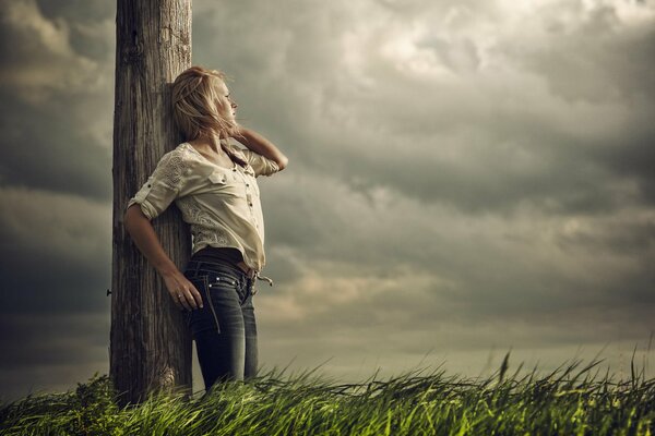 Grey clouds over green grass