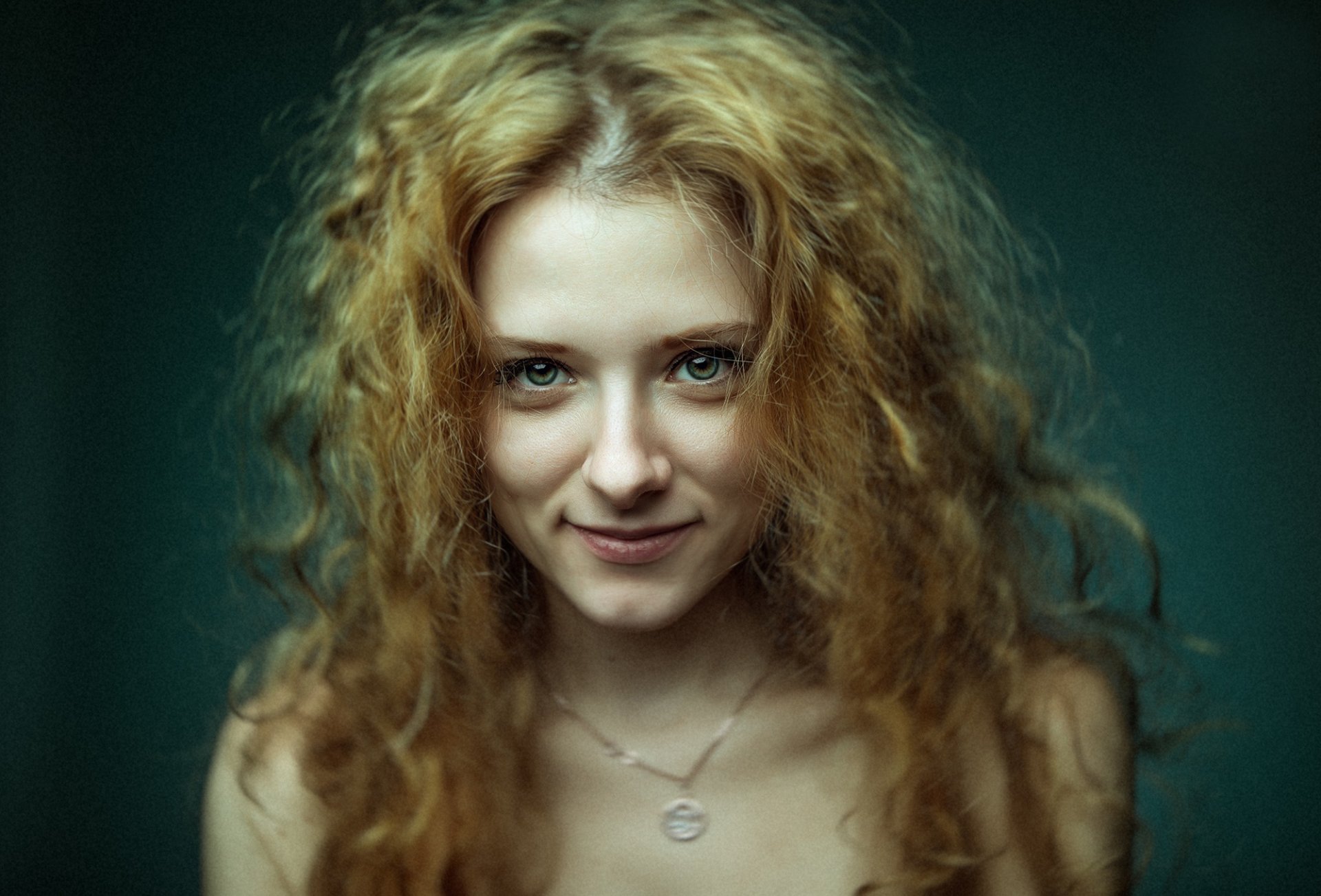 portrait view red hair smile bokeh