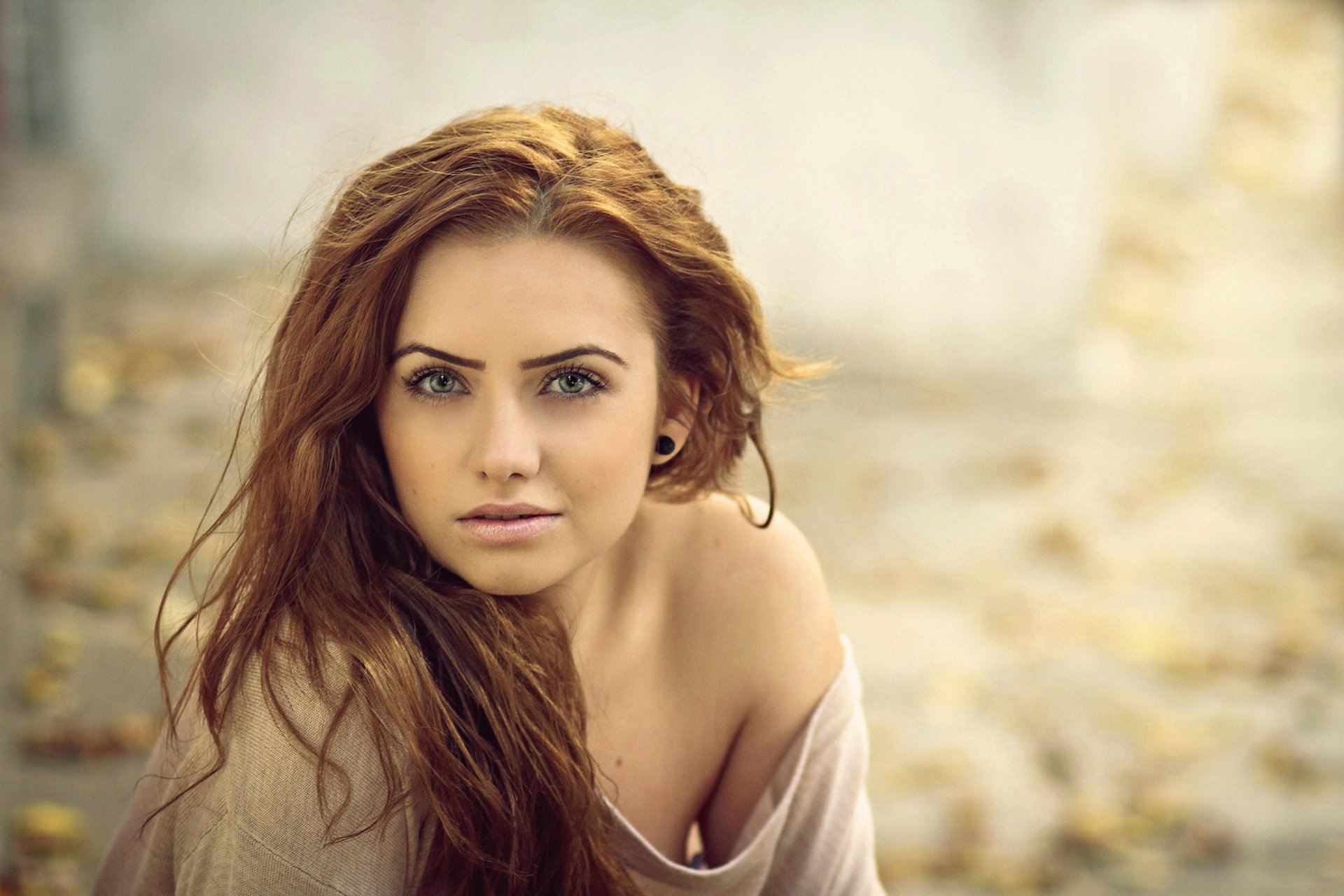 portrait red hair green-eyed view bokeh