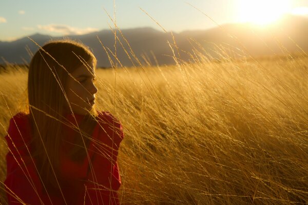 Girl grass sky nose