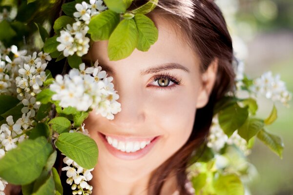 Young pretty girl with flowers