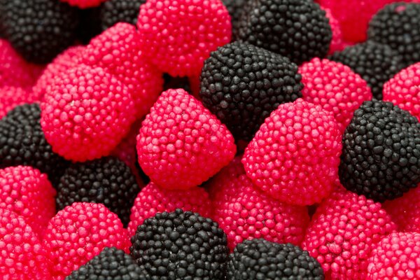 A scattering of marmalade berries of blackberries and raspberries