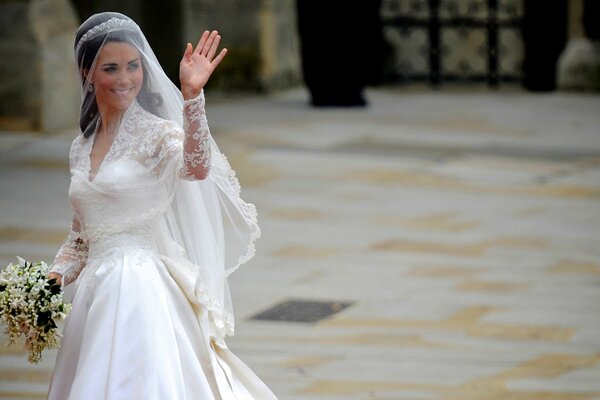 Katherine Middleton in a wedding dress waves