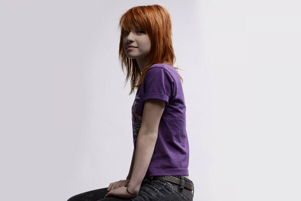 Red-haired singer Hayley in a purple T-shirt