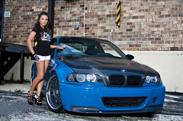 Blue BMW and a beautiful girl