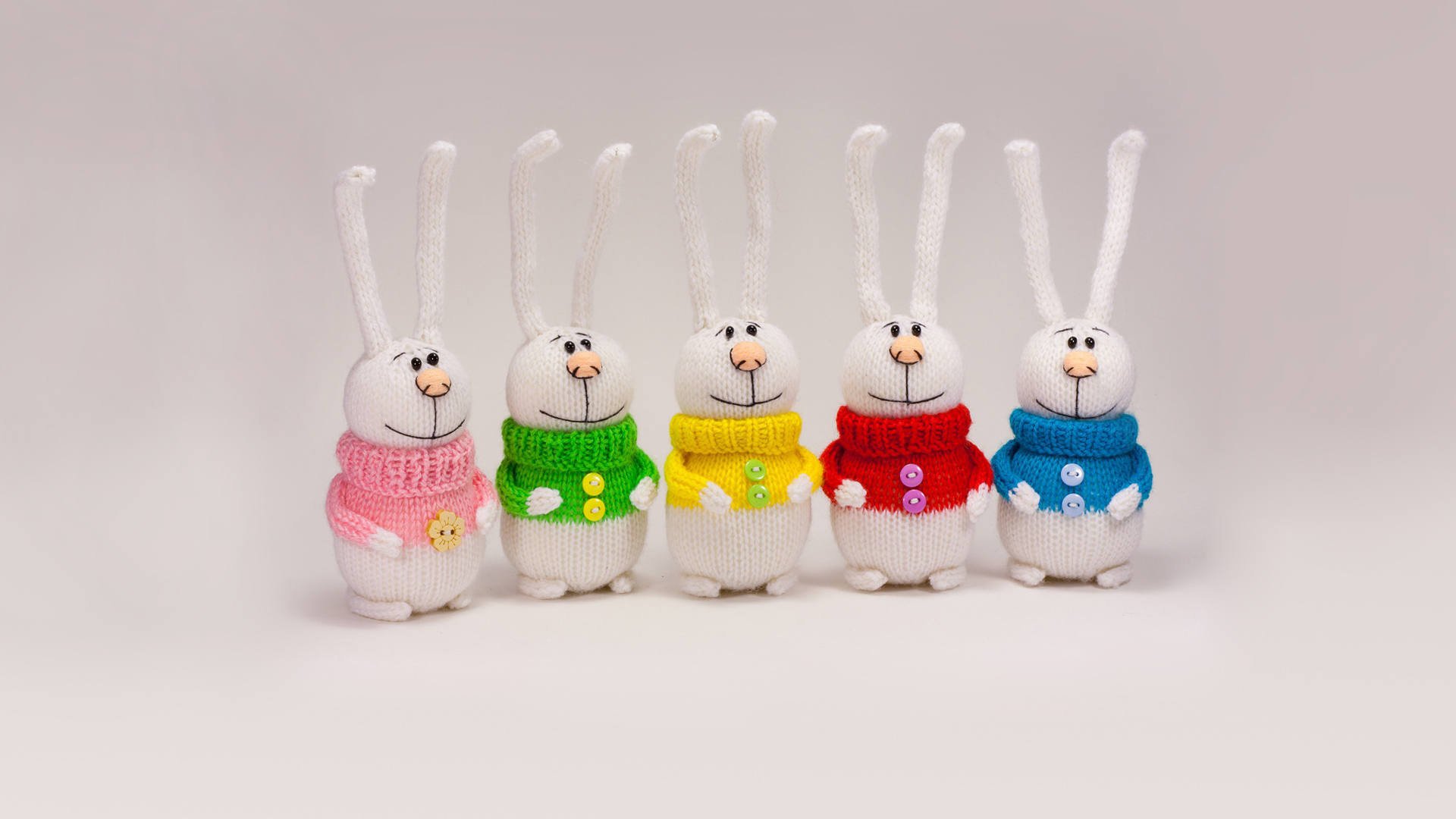 rabbits knitted toy colorful