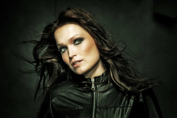 Brunette in a black leather jacket