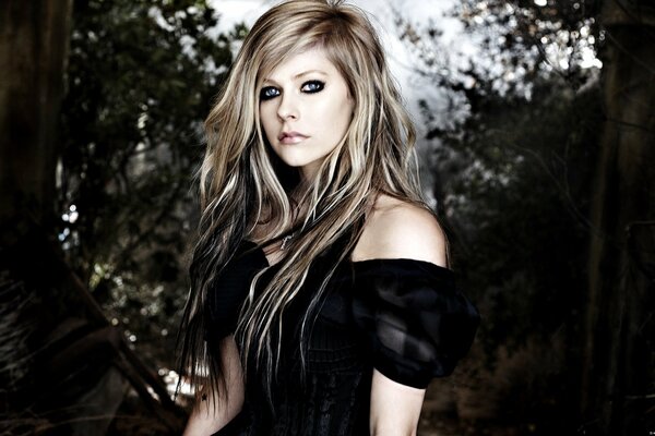 Avril Lavigne in a dark photo shoot with her hair down