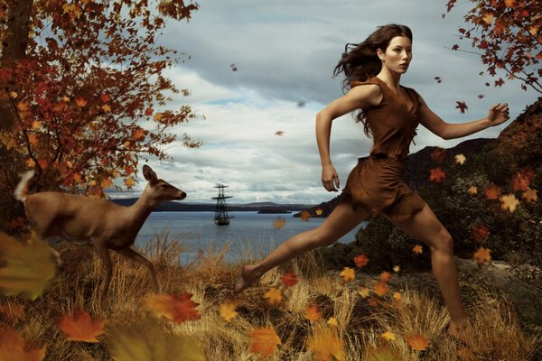 Jessica Biel runs through the woods