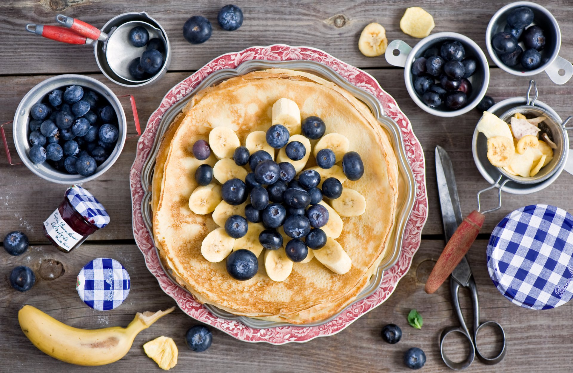 pancakes pancakes berries blueberries bananas jam food jars dishe