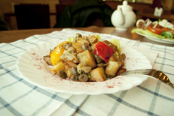 Potatoes with pepper on a plate