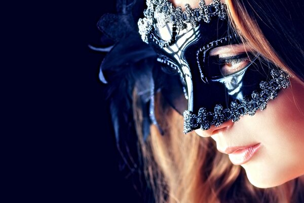 The look of a girl in a black mask